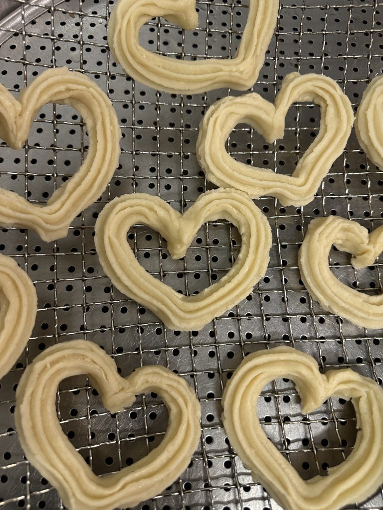 Churros artesanales con forma de corazÃ³n, ideales para San ValentÃ­n, bodas y eventos especiales. Deliciosos churros de Churros PeÃ±acorada, perfectos para celebraciones con amor y tradiciÃ³n.